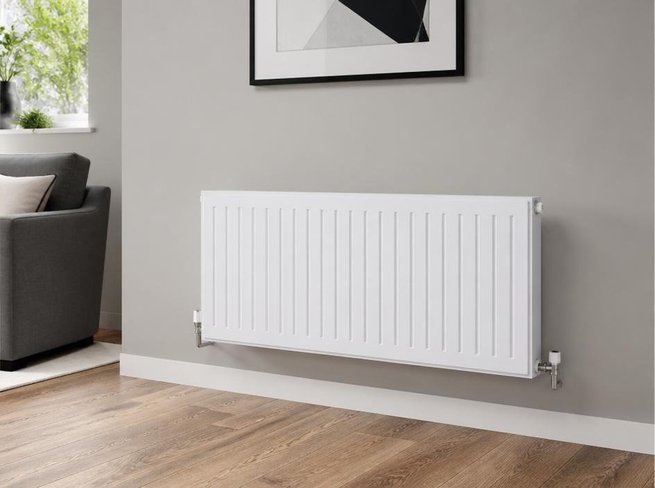 White radiator installed on a living room wall